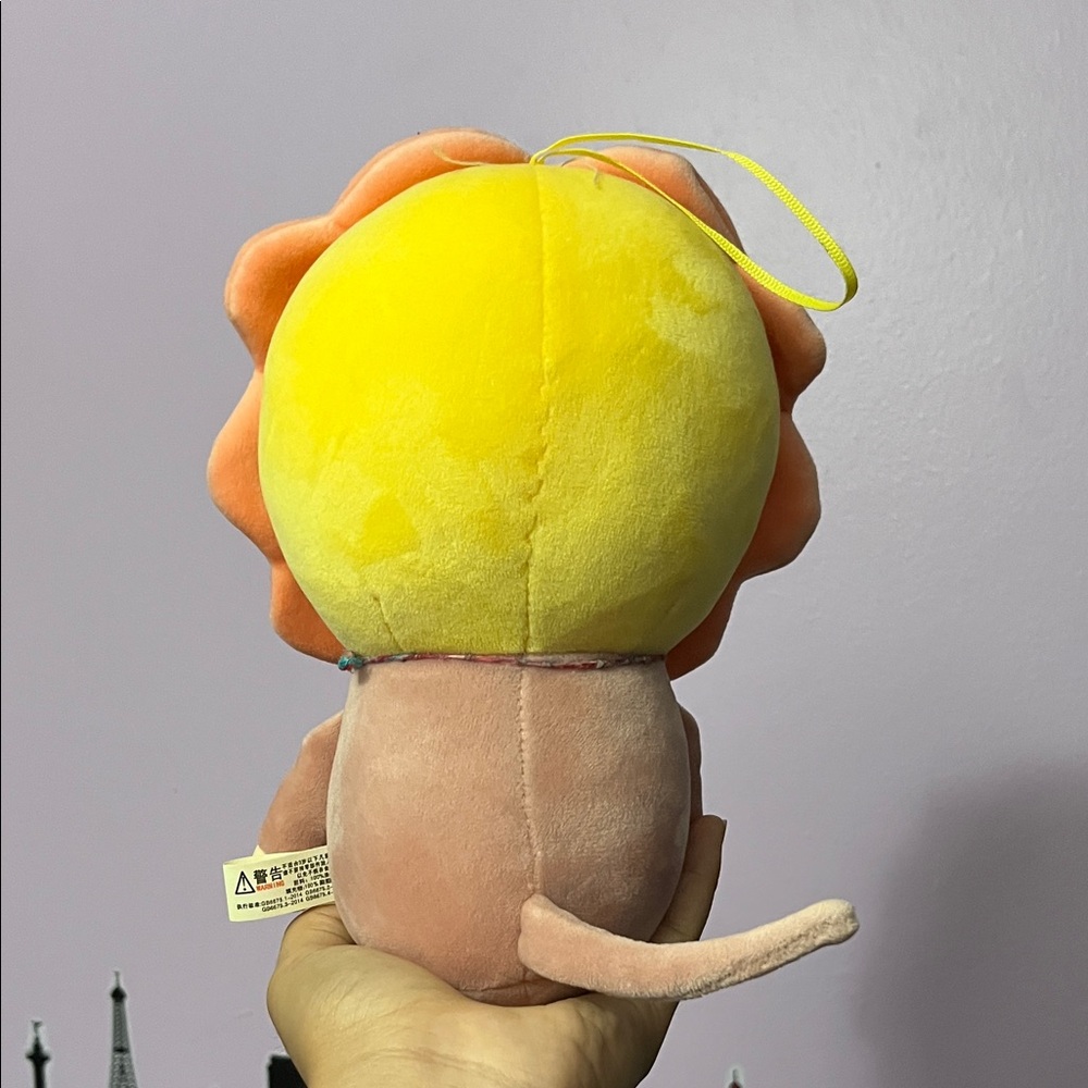 Yellow and orange lion plush toy - Picture 4 of 4
